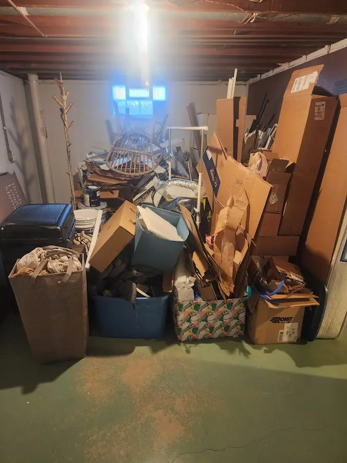 Roll-off dumpster container at job site for 8 Yard Dumpster Rental in Fergus Falls